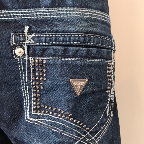 Guess jeans 1981. Daredevil boot cut denim with grommets. - Picture 7 of 10